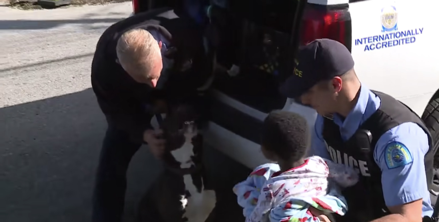 Missing toddler reunites with dad after being found guarded by stray ...