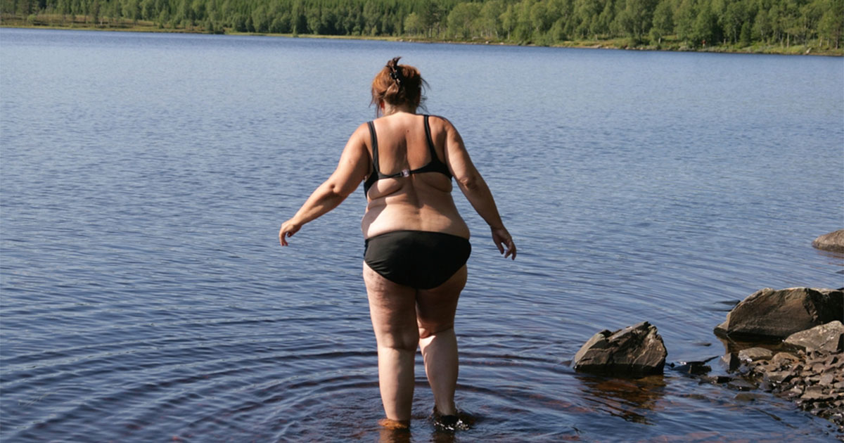 Woman goes swimming. Credit / Shutterstock