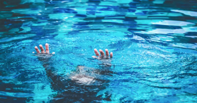 A child struggles in pool. Credit: Shutterstock