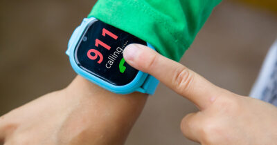 Child uses watch to call 911. (Stock Image) Credit / Shutterstock