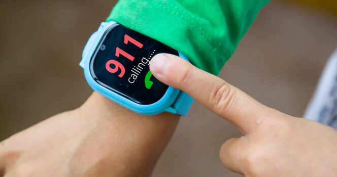 Child uses watch to call 911. (Stock Image) Credit / Shutterstock