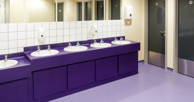 High school bathroom (Stock Image). Credit / Shutterstock