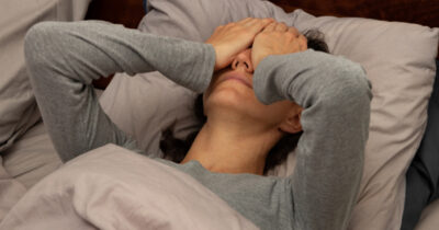 Woman in discomfort. Stock Image. Credit / Shutterstock