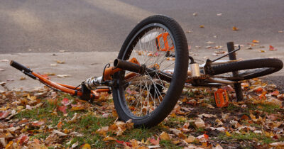 Abandoned kids bike. Stock Image. Credit / Shutterstock