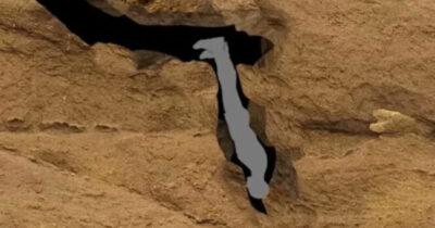 Uomo intrappolato in una caverna.